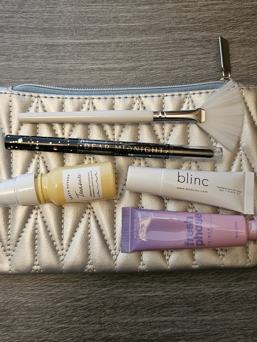 Silver Cosmetic Bag And Makeup Kit